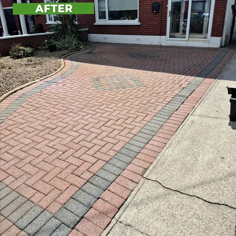 The same brick driveway after cleaning, red colour restored.